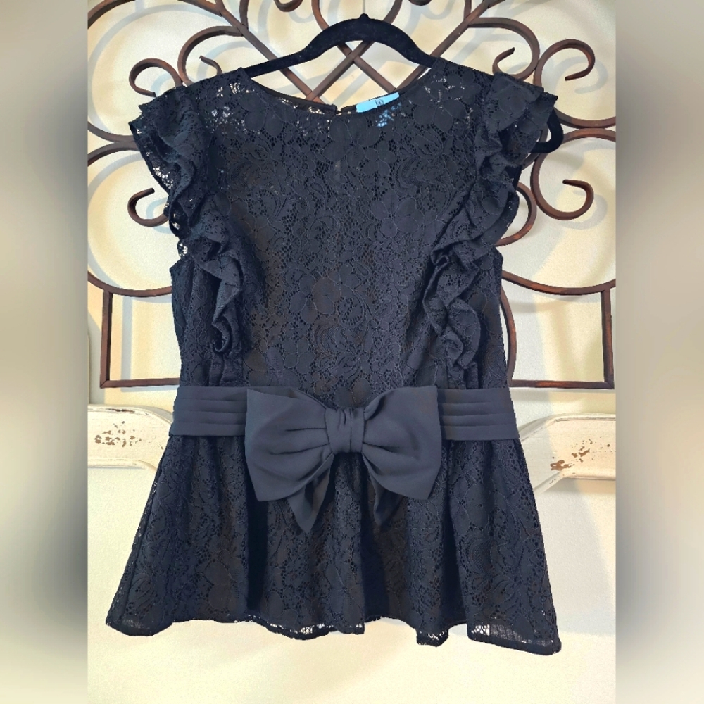Black CeCe Lace Peplum Top with ruffled sleeves size S with a Bow accent